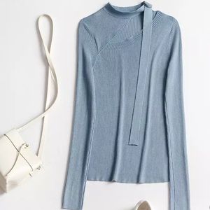Dusty blue sweater with tie neck ribbon detail